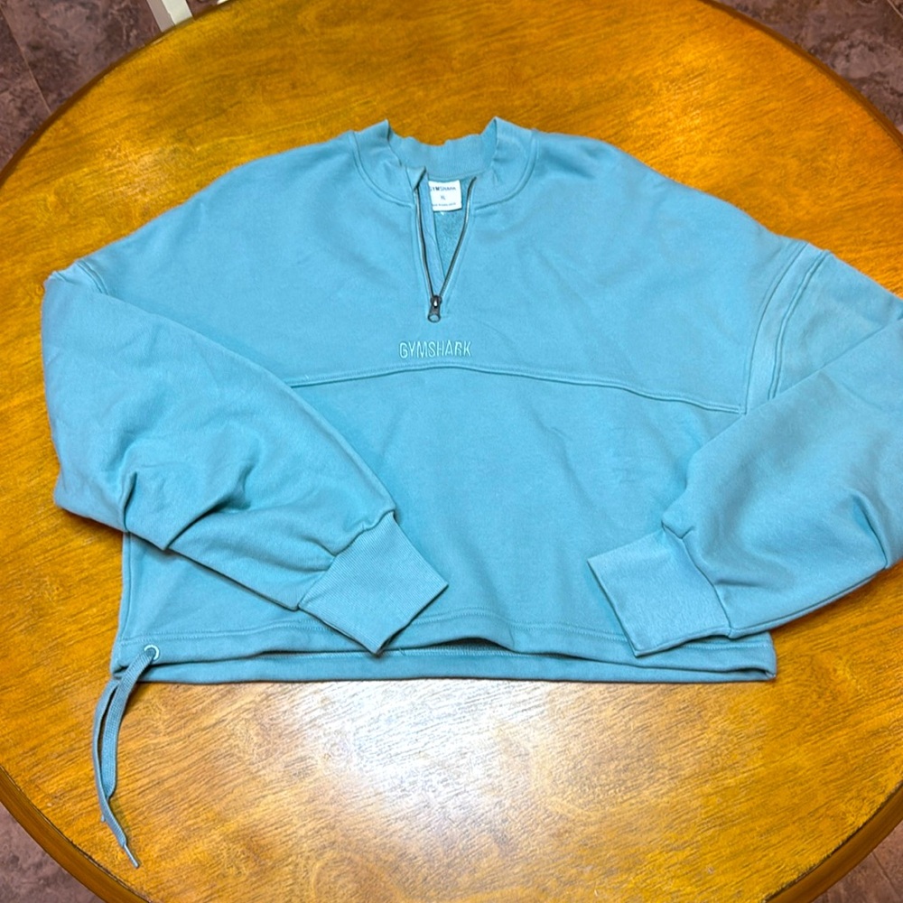 Gymshark cropped sweatshirt.